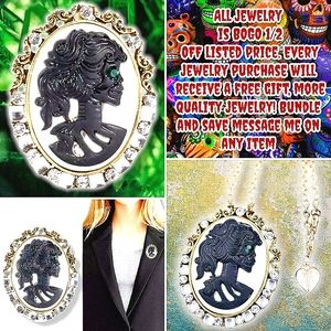 Gold plated green and white crystal cameo skull woman necklace/brooch